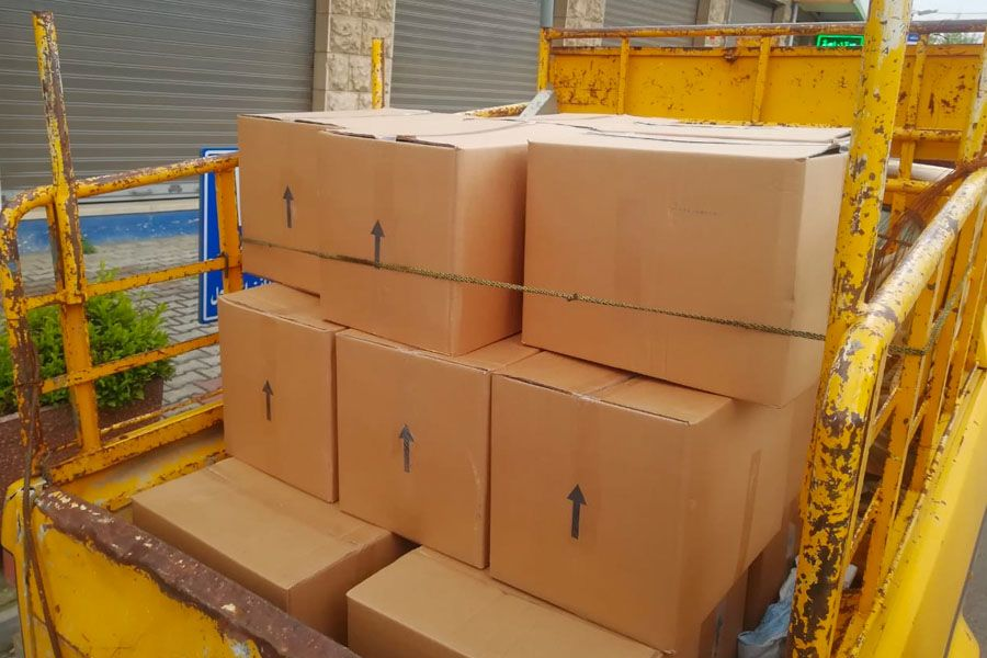 تحضير الحصص الغذائية وتسليمها خلال موجة التوزيع الثالثة، صيف 2020.